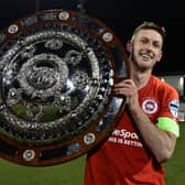 Great things are happening at Larne FC both on and off the pitch. Here Larne captain Jeff Hughes celebrates winning the Co Antrim shield in the final against Glentoran in December 2020. Picture: Colm Lenaghan/Pacemaker