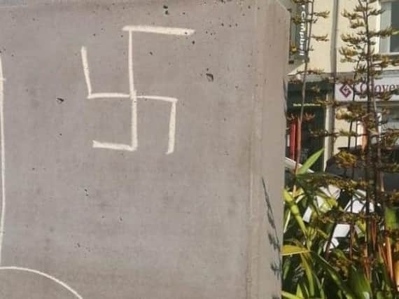 Graffiti including a swastika appeared on the war memorial in Carrickfergus.