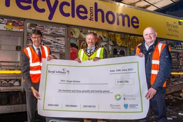 Bryson director Eric Randall with Mid and East Antrim Mayor Councillor William McCaughey, Cryptocycle chairman and co-founder Tony McGurk.