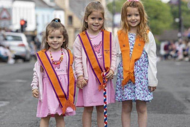 Pictured, left to right, Sisters Amelia, 3, and Anna Newell, 5, with their cousin 4-year-old Faith Newell from Kilkeel, Co. Down, at the annual Twelfth of July celebrations