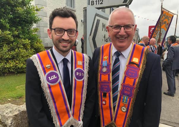 Danny Kennedy with his son Stephen on the Twelfth in Bessbrook