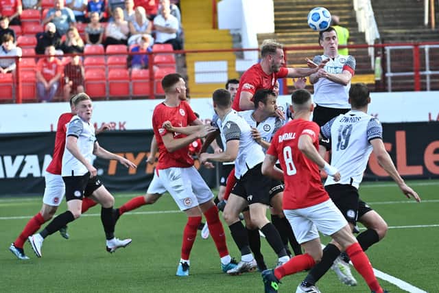 Larne and Bala Town players battle at Inver Park during the Europa Conference League meeting. It marked a first European home tie in club history for Larne. Pic by Pacemaker.