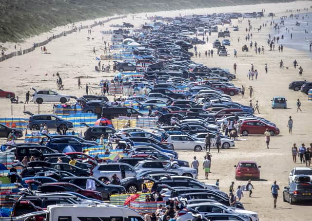 Hundreds of cars full of holidaymakers flocked to Portstewart to enjoy the sun on Friday