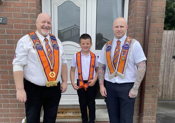David Hildtich MLA with grandson, Jack and son, Michael, on the Twelfth morning.