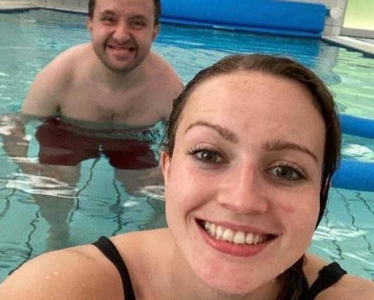 Roddensvale teacher Jenny Kitson, pictured with brother Joel, used the school's hydrotherapy pool to aid her recovery.