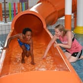 Councillor Sharon Skillen, Chair of the Leisure & Community Development Committee enjoys a splash with 7 year old Adugna at the Disability & Autism Friendly session at Lagan Valley LeisurePlex