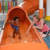 Councillor Sharon Skillen, Chair of the Leisure & Community Development Committee enjoys a splash with 7 year old Adugna at the Disability & Autism Friendly session at Lagan Valley LeisurePlex