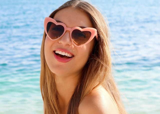 A woman basking in the heat of NI's recent super-sunny spell