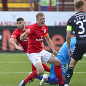 Larne celebrate breaking the deadlock against AGF Aarhus. Pic by Pacemaker.