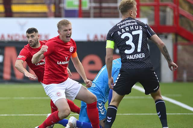 Larne celebrate breaking the deadlock against AGF Aarhus. Pic by Pacemaker.