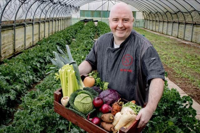 Chef Rob Curley of Slemish Market Supper Club collecting local produce from Slemish Market Garden for his exclusive dining experience. Photo by Kaja Choma / Excalibur Press
