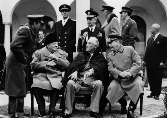In the grounds of the Livadia Palace, Yalta, during the Three Power Conference the British wartime Prime Minister Sir Winston Leonard Spencer Churchill (1874 - 1965), the 32nd President of the United States of America Franklin Delano Roosevelt (1882 - 1945) and the Soviet leader Joseph Stalin (1879 - 1953) (Iosif Vissarionovich Dzhugashvili).   (Photo by Keystone/Getty Images)