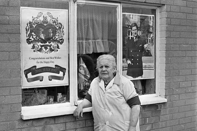 Seventy-one-year-old Mary Ann Hammond decorated the windows of her Shankill Road to celebrate the Royal wedding in July 1981. Picture: News Letter archives