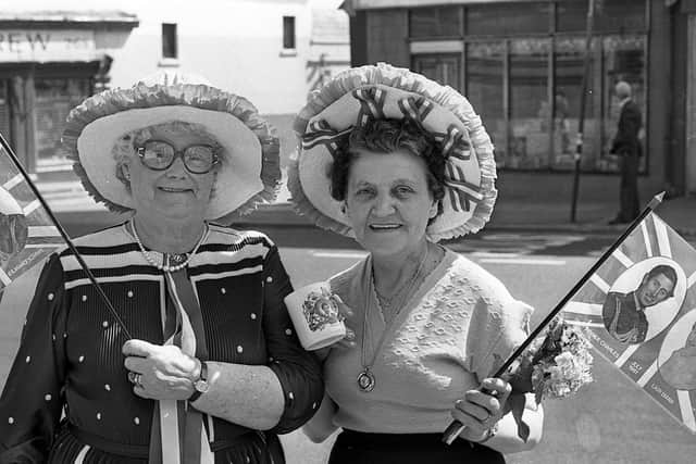 Mrs Sally Wheelan and Mrs Ena Haddock from Woodvale, members of the Ainsworth Womenâ€TMs Club, dressed up in red, white and blue for the Royal wedding in July 1981. Picture: Bob Hamilton and Randall Mulligan/News Letter archives