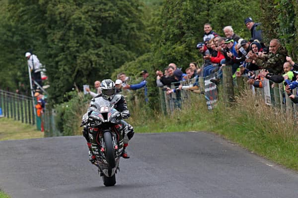 Michael Dunlop won the 'Race of Legends' for a record ninth straight time at the Armoy Road Races on Saturday.