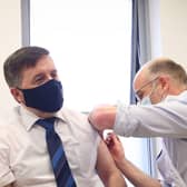 Health Minister Robin Swann receiving his vaccine at a community pharmacy in Ballymena.

He is pictured at the Ballee Pharmacy with pharmacist Stephen Burns. 

Picture: Kelvin Boyes / Press Eye.