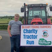 Bleary Young Farmers Club is organising a Charity Tractor Run this month Macmillan Cancer Support and Bleary YFC. Pictured here are Harry and Matthew Givan who are proudly leading the tractor run.