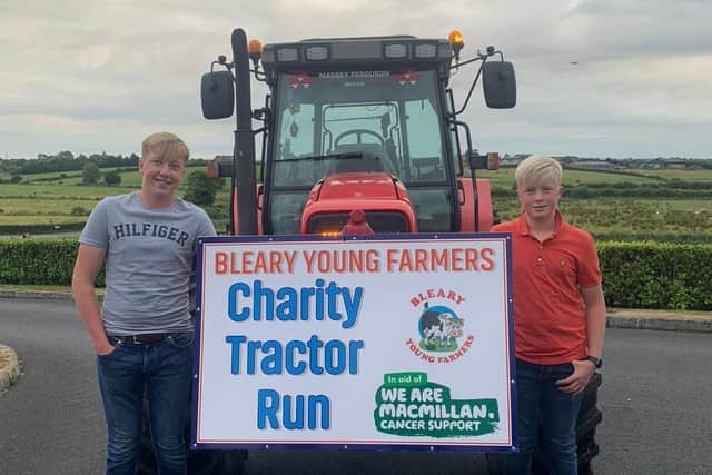 Bleary Young Farmers Club is organising a Charity Tractor Run this month Macmillan Cancer Support and Bleary YFC. Pictured here are Harry and Matthew Givan who are proudly leading the tractor run.