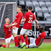 Ronan Hale celebrates his goal against Aarhus