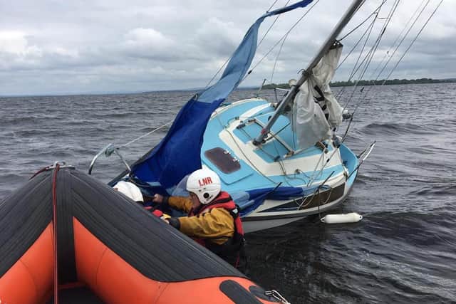 Lough Neagh Rescue were tasked to save three people after a sailing boat ran aground