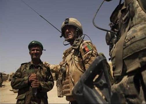 Captain Doug Beattie with an Afghan commander in Afghanistan.