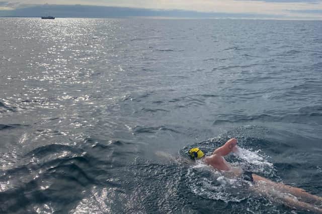 Portadown man Jordan Leckey swimming from Donaghadee to Scotland  on his North Channel swim. He smashed the Guinness World Record, swimming it in nine hours, five minutes and 30 seconds.