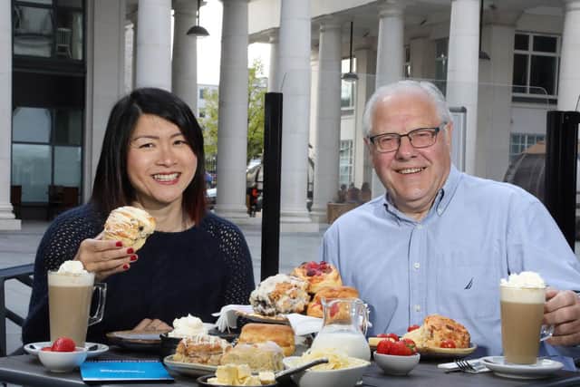 Best Scones NI is now at the crucial public voting stage of the competition. Pictured enjoying the baked treats are Suzie Lee and Dairy Council NI CEO, Dr Mike Johnston.