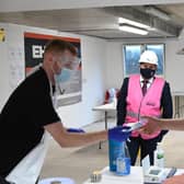 Health Minister Robin Swann during a visit to an  employer-led Assisted Testing Site in Belfast. Picture: Michael Cooper