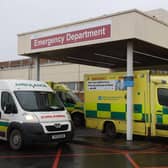 Ambulances outside the emergency department entrance of Craigavon Area Hospital.