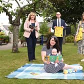 Education Minister Michelle McIlveen, Chris Eisenstadt, Director, Northern Ireland Booktrust, - Laura Gallagher, Student Health Visitor, Mum, Judith Ewing and baby, Eric Ewing