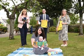 Education Minister Michelle McIlveen, Chris Eisenstadt, Director, Northern Ireland Booktrust, - Laura Gallagher, Student Health Visitor, Mum, Judith Ewing and baby, Eric Ewing