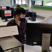 The Athletes team (Aaron Stevenson and Jude Moore) taking part in the second stage of the national UK Skills Industrial
Robotics Competition.competition at the NRC's Ballymena Campus