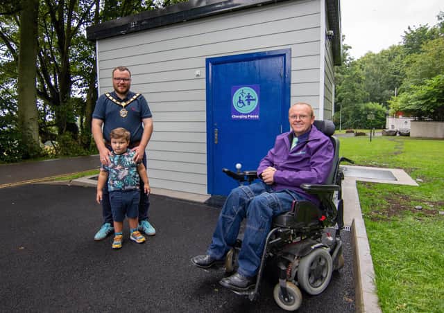 The Deputy Mayor, Cllr Matthew Armstrong, and his son along with Accessoloo representative, Michael Holden.