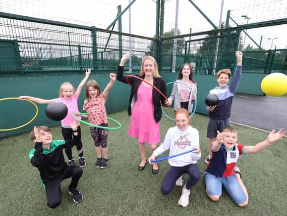 Lots of outdoor fun was had at Lagan Valley LeisurePlex Summer Scheme. Pictured L-R: Oisin O’Hagan, Eva Doherty, Indie McCrea, Chair of the Leisure & Community Development Committee, Councillor Sharon Skillen, Niamh Cooke, James Doherty (back row), Orlaith McConville and Jacob Doherty