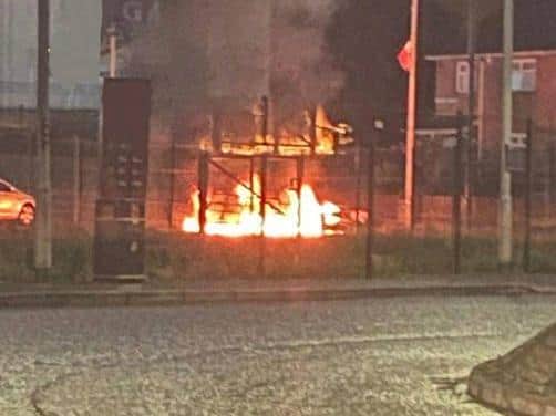 PSNI picture showing furniture on fire in an attempt to block the roadway at Ballygawley Road, Dungannon, earlier today.