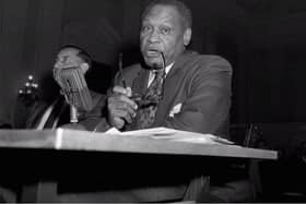 Singer Paul Robeson testifies in Washington June 12, 1956, before the House Committee on Un-American Activities. Robeson, who also excelled as a lawyer, athlete and scholar, risked everything to become a human rights activist, and his visits with supporters in the Soviet Union were a cardinal sin in the red-baiting McCarthy era. (AP Photo/Bill Achatz)