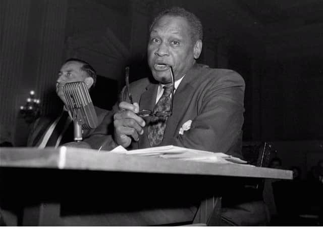 Singer Paul Robeson testifies in Washington June 12, 1956, before the House Committee on Un-American Activities. Robeson, who also excelled as a lawyer, athlete and scholar, risked everything to become a human rights activist, and his visits with supporters in the Soviet Union were a cardinal sin in the red-baiting McCarthy era. (AP Photo/Bill Achatz)