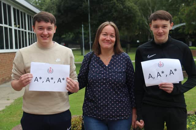 Daniel and Connor McGurk with their mum.