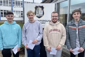 Carrickfergus Academy pupils collecting their exam results on Tuesday.