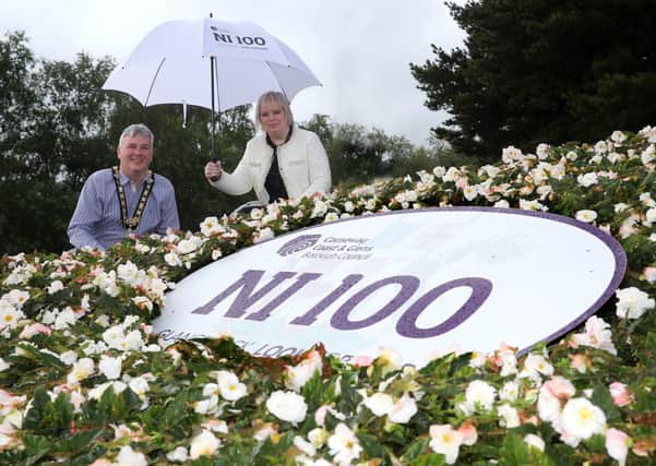 The Mayor of Causeway Coast and Glens Borough Council Councillor Richard Holmes and Councillor Michelle Knight McQuillan pictured at one of the NI 100 themed flowerbeds located near the Lodge Road roundabout in Coleraine
