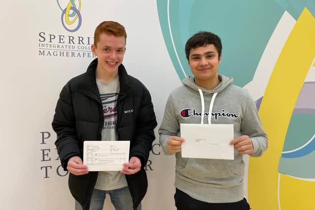 Pictured are Joshua McNinch and Ryan Ridge with their A Level results.
