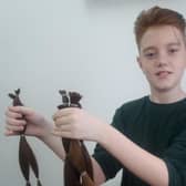 James pictured shows off his locks which have been sent off to the Little Princess Trust to be turned into a wig.