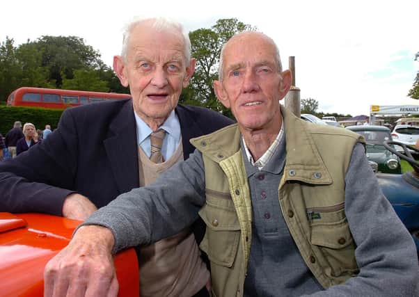 Catching up at the Desertmartin Parish Church’s 25th annual garden fete and vintage rally in August 2010 are James White and Brendan McErlean. Picture: Simon Robinson/Mid Ulster Mail archives