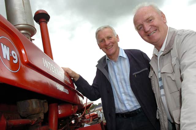 Derek Paul and Robert Holmes check out this vintage International tractor at Desertmartin Parish Church’s 25th annual garden fete and vintage rally in August 2010. Picture: Simon Robinson/Mid Ulster Mail archives