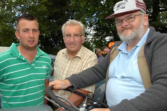 Pictured at  Desertmartin Parish Church’s 25th annual garden fete and vintage rally in August 2010 are Raymond Benton, Keith and Victor Muldoon. Picture: Simon Robinson/Mid Ulster Mail archives