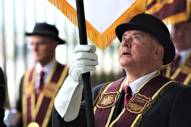 Press Eye - Belfast - Northern Ireland - 14th August 2021

Apprentice Boys of Derry ParadeApprentice Boys of Derry

Relief of Derry Parade. 

A member of the  Apprentice Boys of Derry checking his banner pole.

Mandatory Credit ©Lorcan Doherty/Presseye