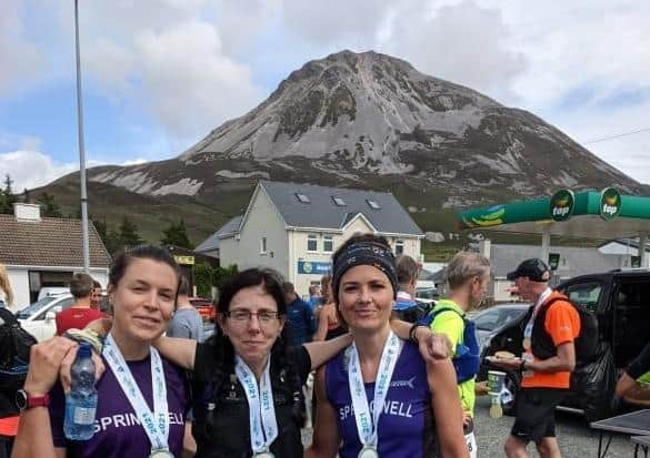 Nicky Frizelle, Adele Tomb & Carolyn Crawford at the finish of the Seven Sisters Sky Challenge