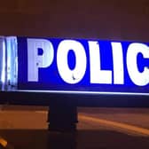 Police are hunting armed robbers who made off with cash from commercial premises in Pomeroy.