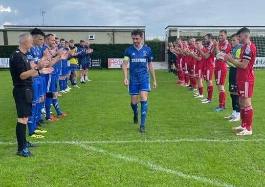 A guard of honour at Planters Park before Aaron Moffett's final appearance for Dollingstown against Portadown. Pic courtesy of Dollingstown FC.