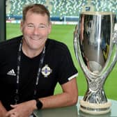 Andy Smyth pictured at Windsor Park with the UEFA Super Cup.